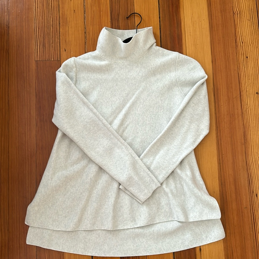 Gray COS long sleeve top. Stretchy and super comfortable. Size small.